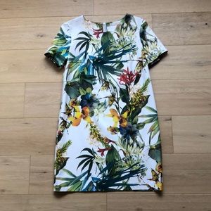 Vegan leather tropical mini dress